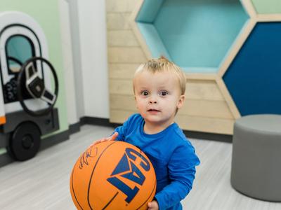 A young boy with a basketball