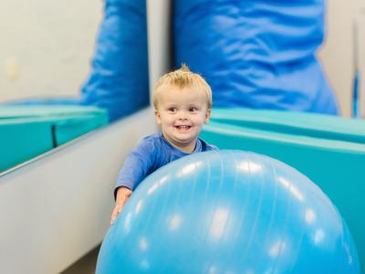 Boy with a big bouncy ball