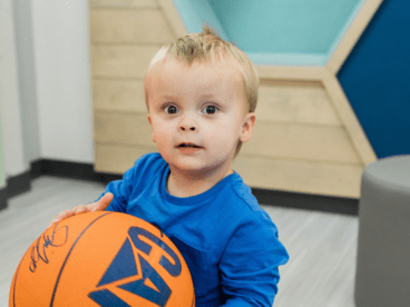 Child with a basketball