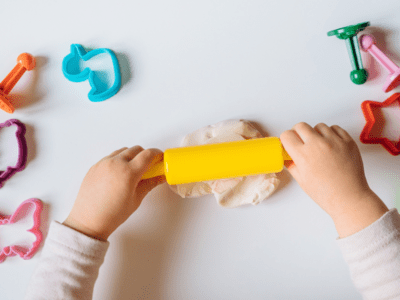 Child playing with clay